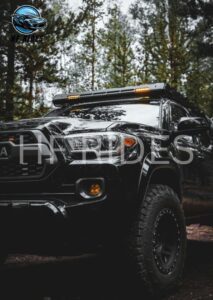 Front perspective of a black Toyota Tacoma 