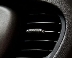 Close-up of a car AC vent highlighting the importance of clean airflow from cabin air filters