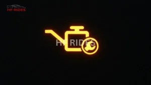 A yellow warning light illuminated on a car's dashboard, indicating a potential issue that requires attention. - Honda Civic Dashboard Warning Lights