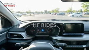 A car parked in a parking lot showing blue dashboard warning light - What Is the Blue Light on My Dashboard