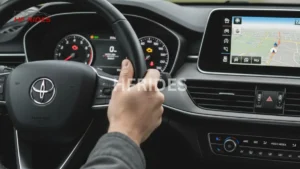 The car's dashboard features a modern GPS system for navigation assistance. - Dashboard warning lights