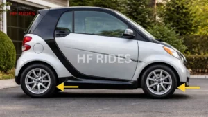 Side view of a Smart Fortwo coupe showcasing its sleek bumper design and compact dimensions. - What is the Tire Pressure for a Smart Car