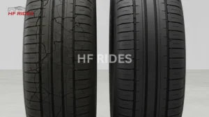Close-up of two tires. Left tire is worn and cracked, conveying a sense of deterioration. Right tire is new with intact tread, symbolizing safety and reliability. - How often should you change your car tires