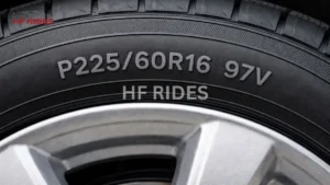 A close-up of a tire displaying the markings p225 / 6 / 16 / 16 / 16 / 16 on its sidewall. - what do the numbers on a tire mean